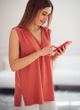 Coral blouse with V-neckline, universal style