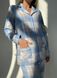 Warm women's pajamas made of flannel in a blue and grey cage, home clothes, S